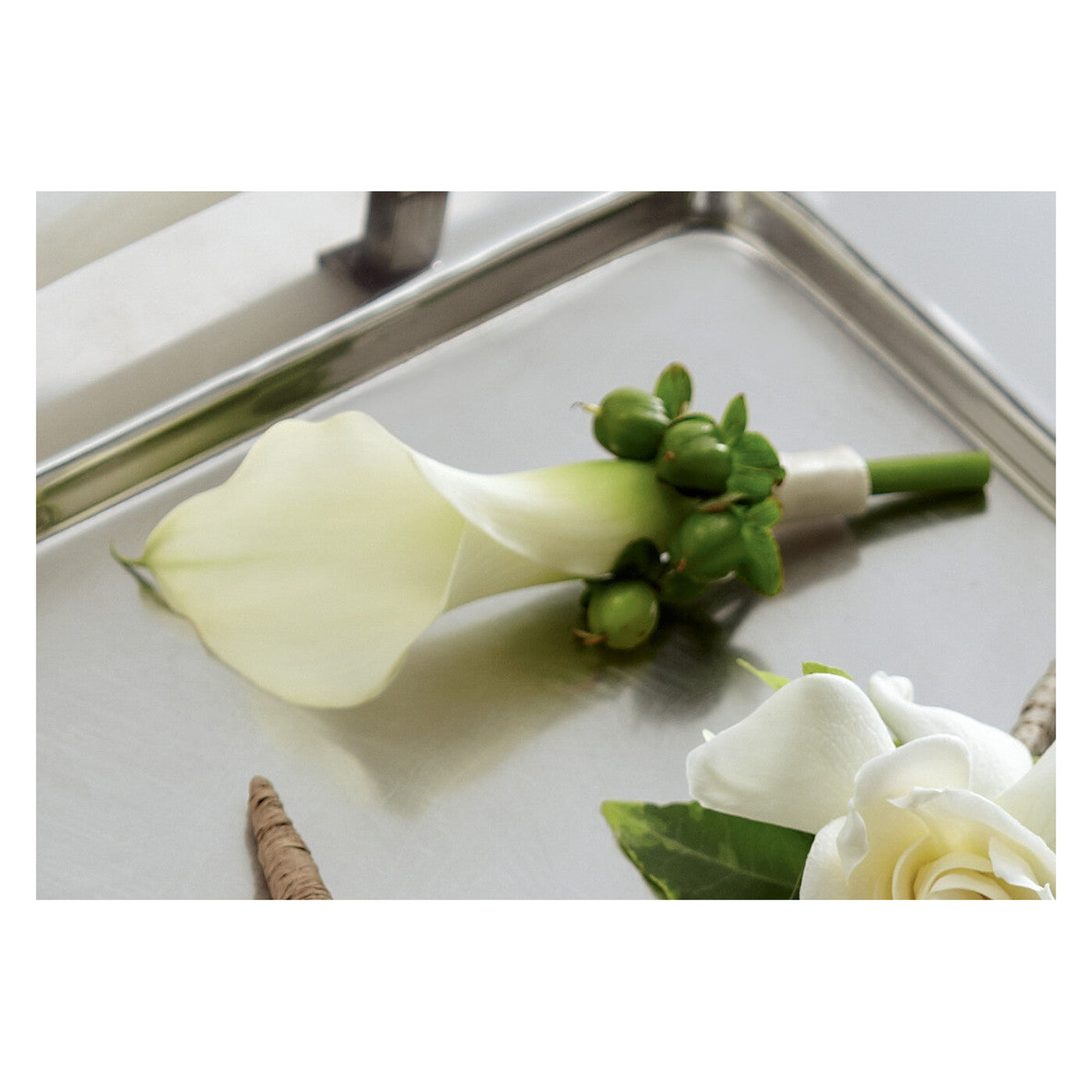 White Calla Boutonniere flower arrangement